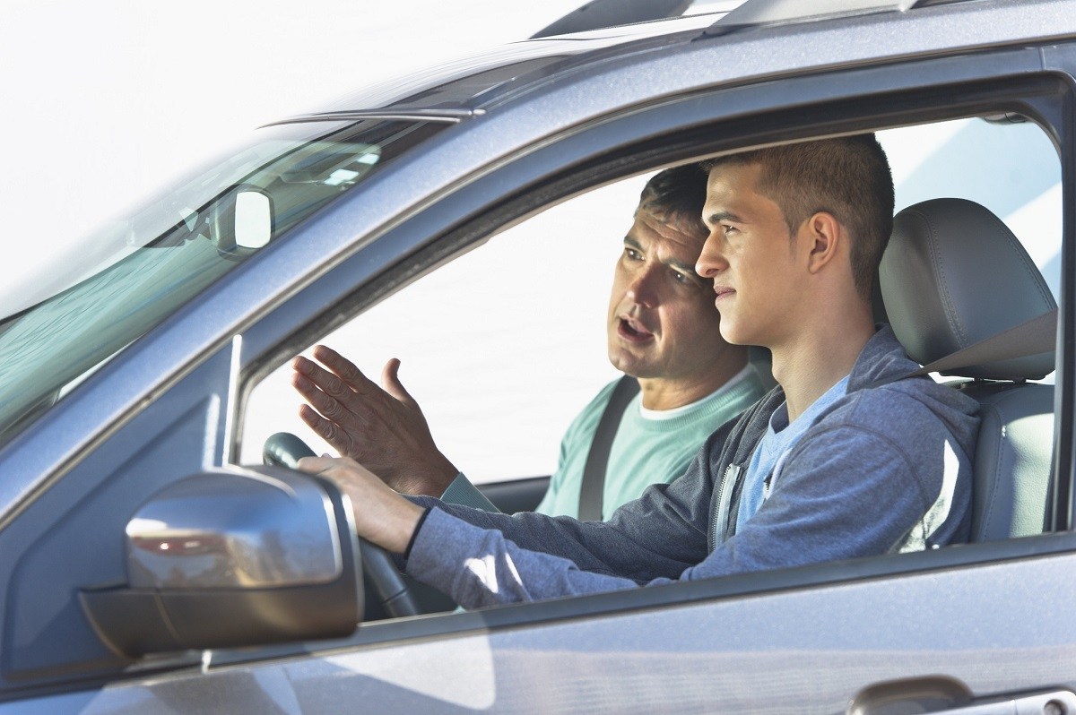 City fathers. Car Driving. Driver without car. Father and son Driving a car. Intensive Driving course.